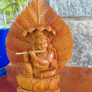 Pure Sandalwood Antique Shri Krishna Statue for Home decor Laddoo Gopal Showpiece Figurine of Kishna Hindu Lord Krishna Idol on Leaf Vintage decor God Gopala Krishna Idol